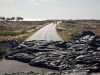 Ein erkalteter Lavastrom über der Straße im Volcanoes National Park. <br>© Destination Hawaii